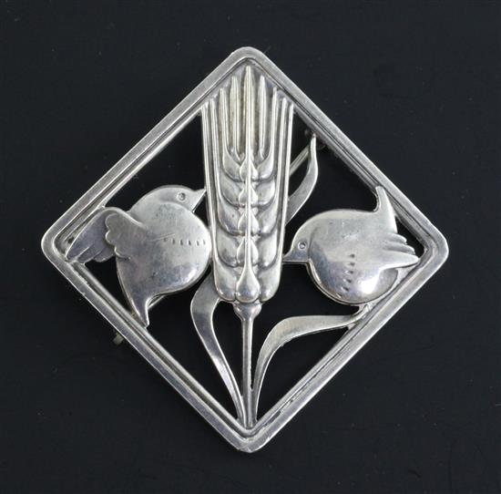 An early 1960s Georg Jensen sterling silver dove and wheatsheaf brooch, no. 250, 1.5in.